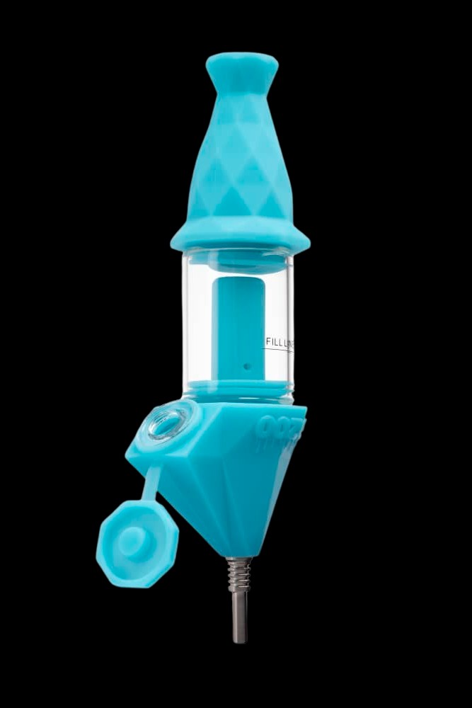 Blue silicone oil rig with glass chamber and metal coil tip.