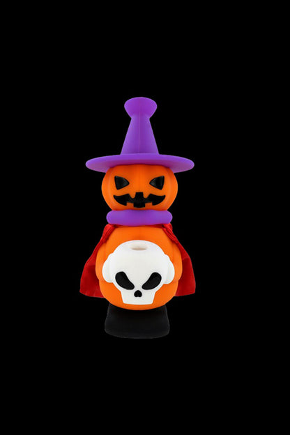 Halloween-themed silicone dab rig with a jack-o'-lantern top and skull base.
