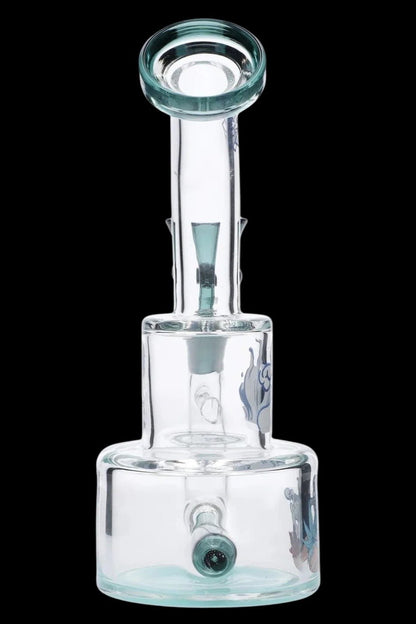 Front view of the Cabana Cannabis Co. Ahoy Dab Rig - Teal showing its clear glass chamber, teal accents, and straight neck against black.