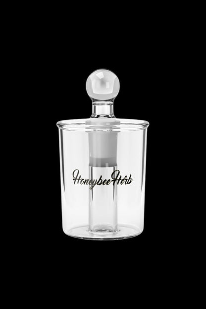 Clear glass bubbler with “Honeybee Herb” script.