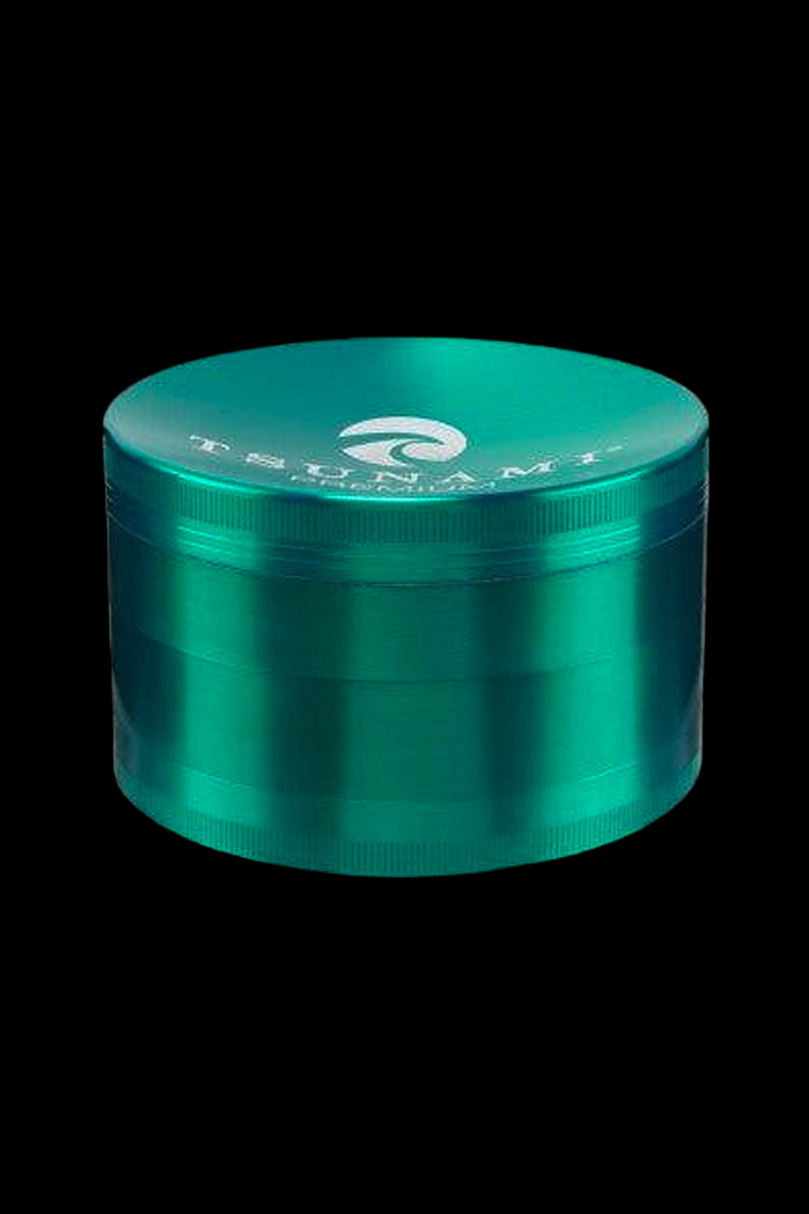 Teal four-piece cannabis grinder isolated on a black background.