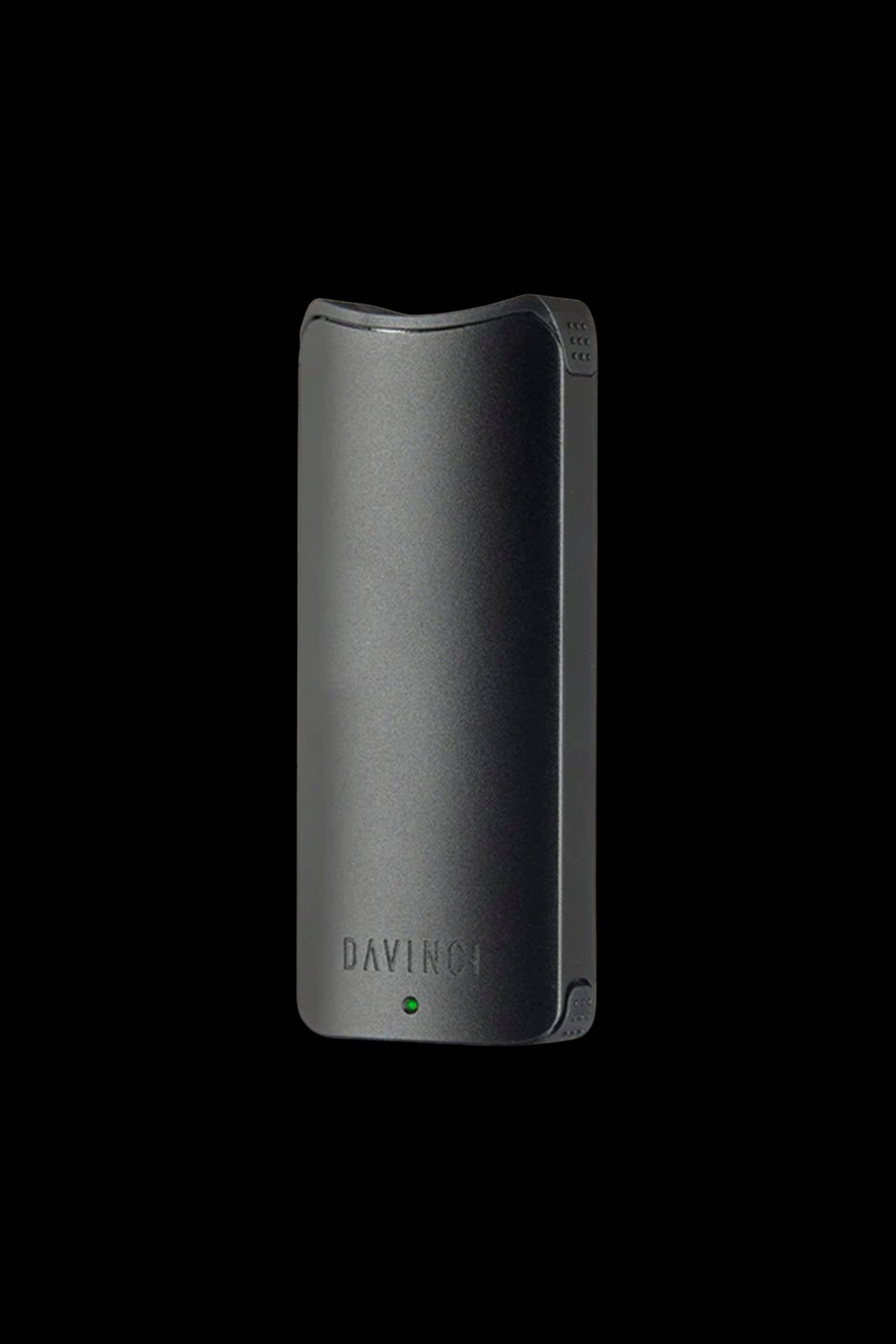 Black DaVinci IQ2 vaporizer pen on a dark background.