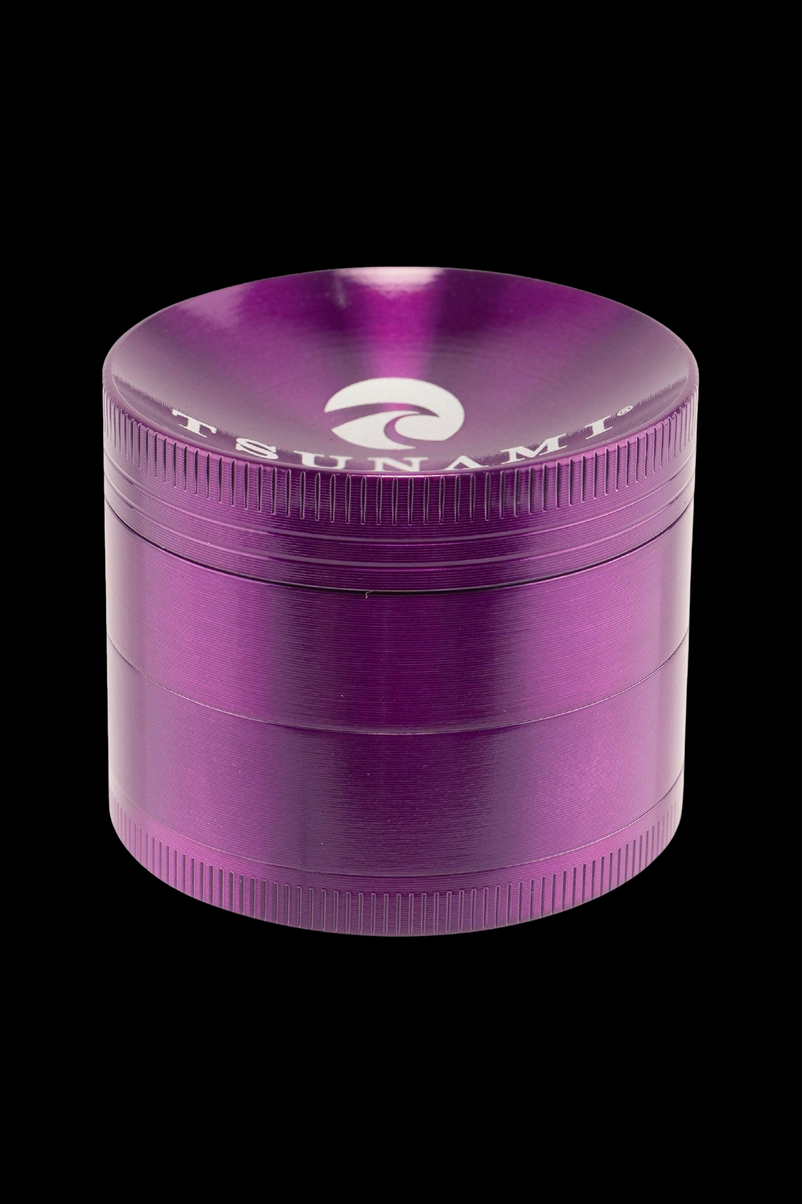 Purple four-piece metal grinder for cannabis.