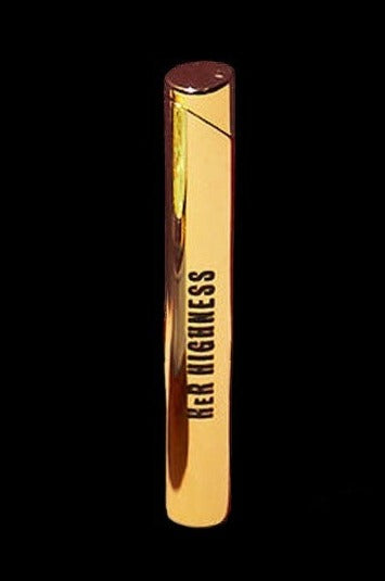 Gold lighter with text reading “Her Highness” against a black background.