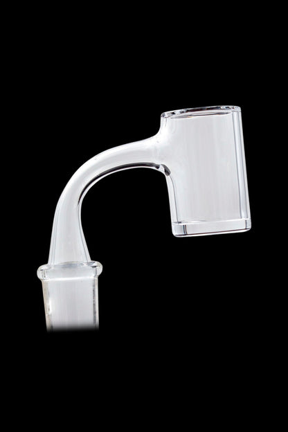 Clear quartz dab rig insert against a black background.