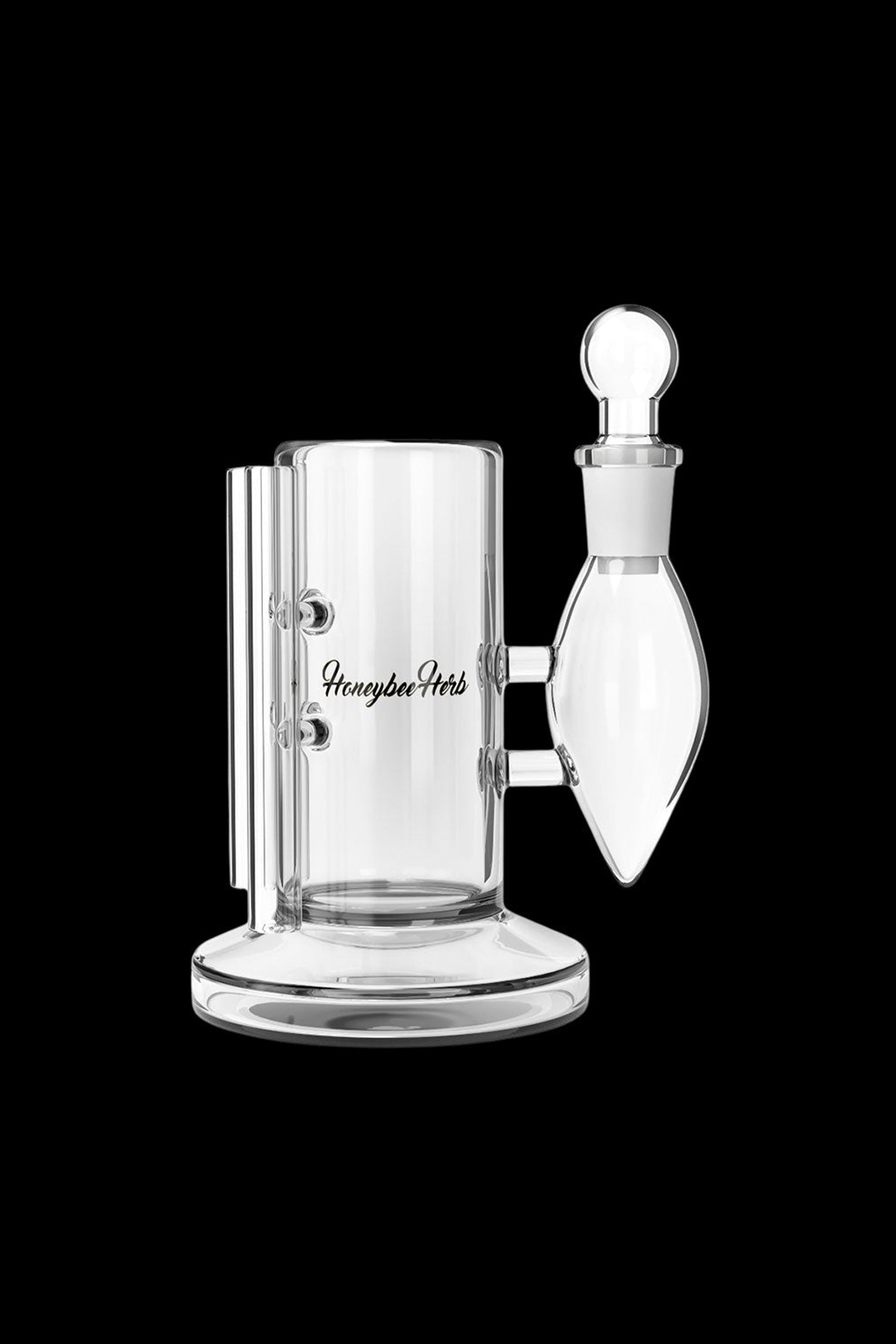 Clear glass dab rig with “Honeybee Herb” branding, featuring a cylindrical base and angled neck.