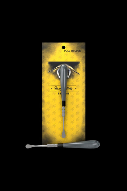 Top-down view of the Gray Honeybee Herb Classic Dab Tool centered on its yellow branded card with a bee graphic and black background
