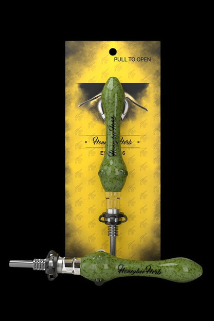 Centered front view of the Honeybee Herb Speckled Glass Nectar Collector showing a yellow-speckled green glass body with black script logo against a yellow branded card.