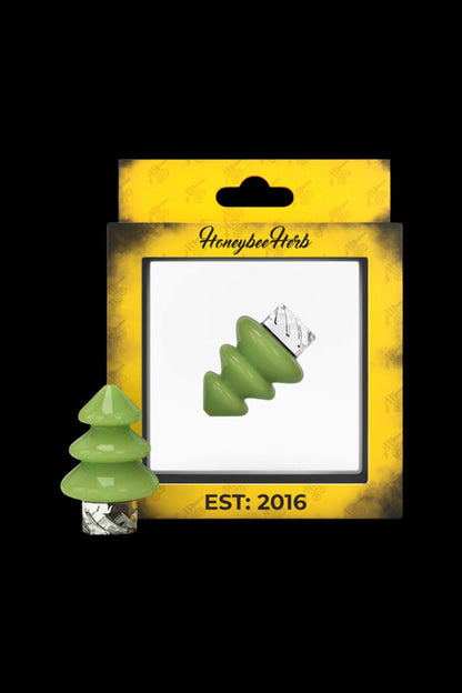 Packaged green cannabis bud with “Honeybee Herb” branding and “Est. 2016” text.