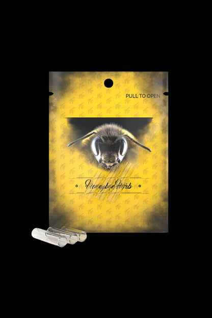 Yellow mylar bag with a bee illustration and the text “Honeybud Herb” alongside cannabis oil capsules.
