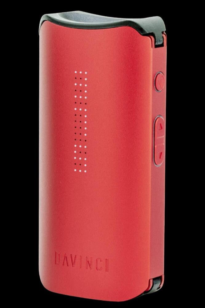 Red DaVinci IQ2 vaporizer with perforated front panel.