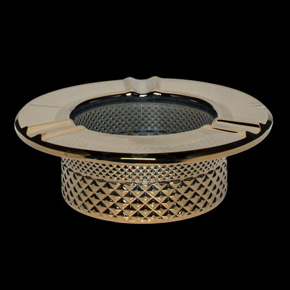 Gold ashtray with textured detailing, designed for cannabis use.