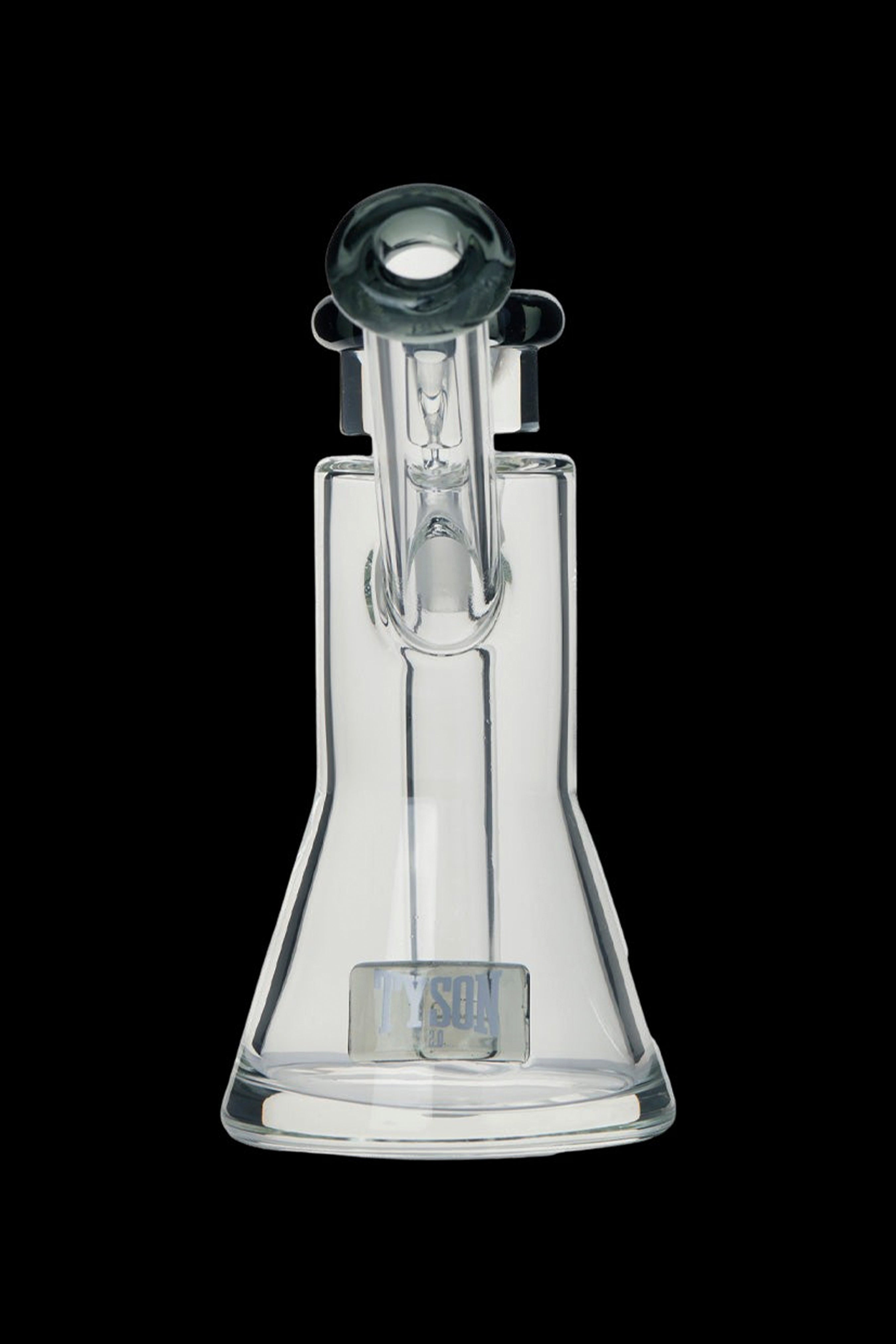 Clear glass rig with intricate design and bubbler mouthpiece.