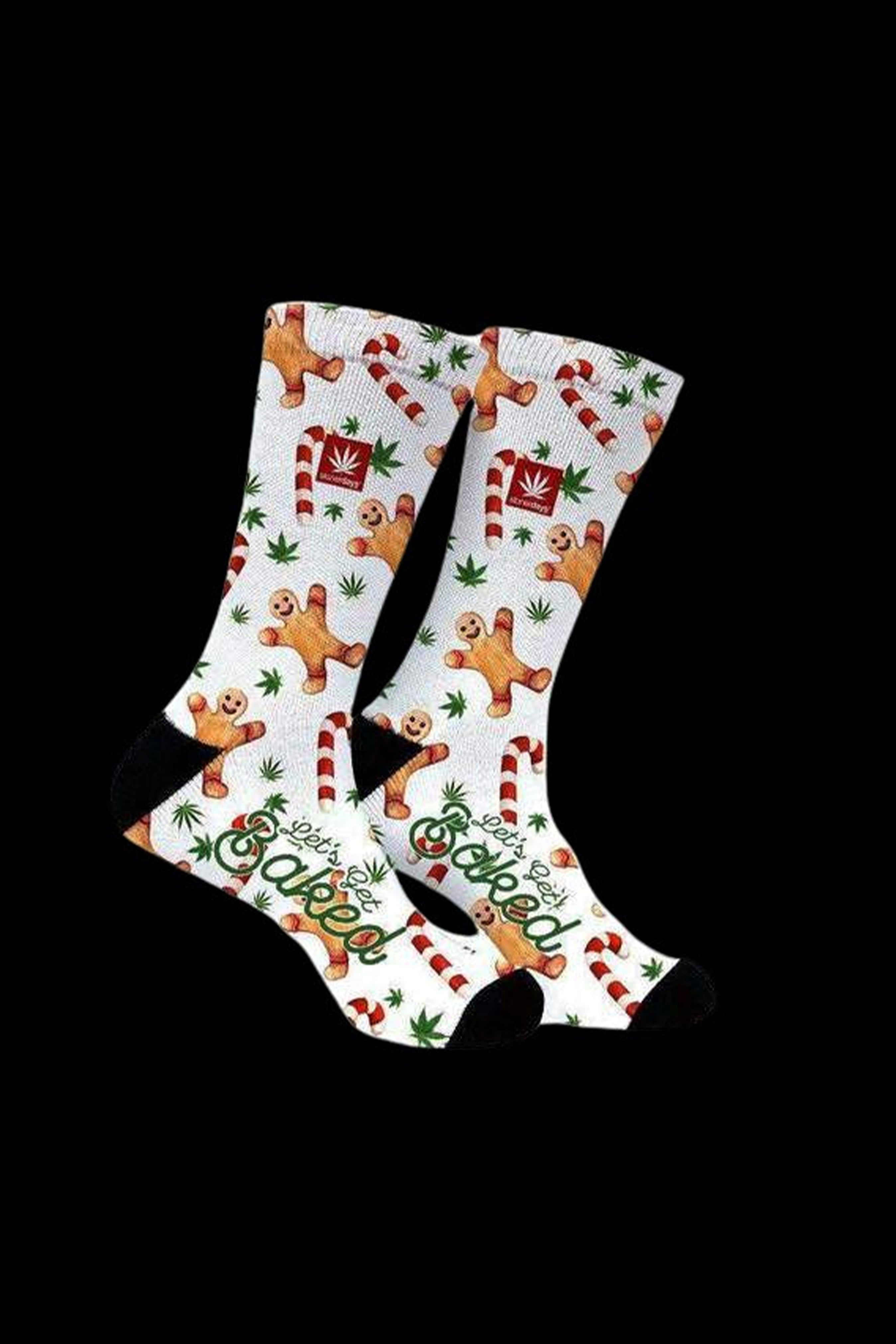 Knee-high socks with a gingerbread man pattern and cannabis leaves, featuring the text “Let's Get Baked.”