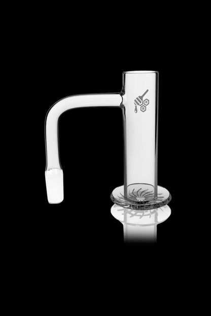 Clear glass oil rig with intricate base design.