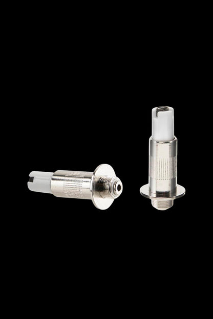 Silver cannabis oil atomizer components on a black background.
