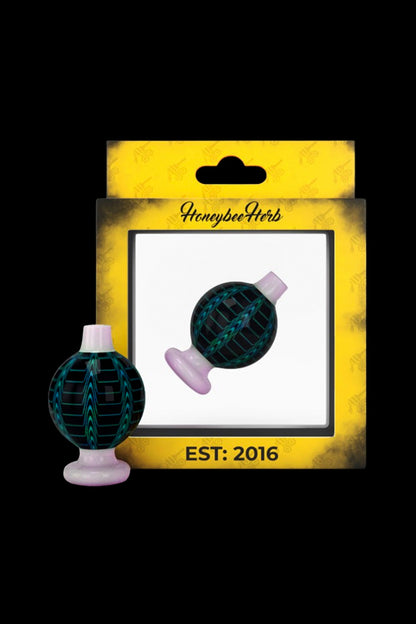 Glass water pipe in a display box with “Honeybee Herb” branding and “Est. 2016”.