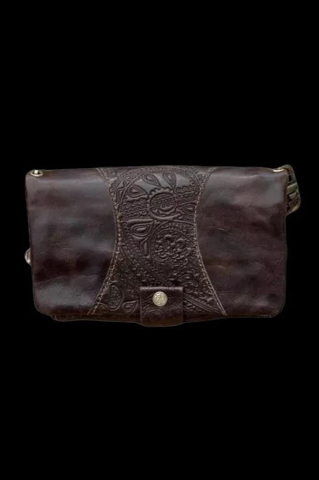 Dark brown leather smell-proof bag with embossed floral detailing.