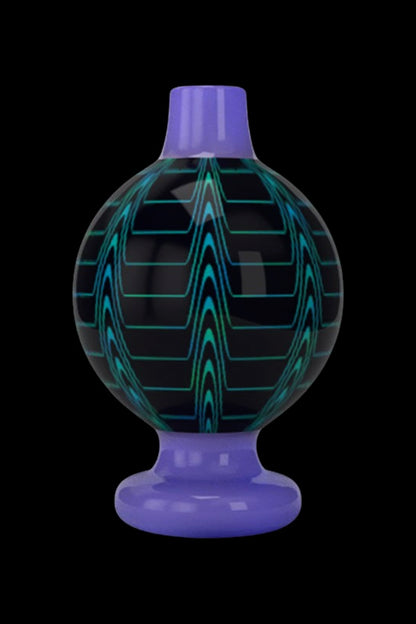 Purple glass cannabis dab rig water pipe.