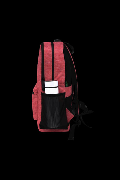 Side profile of an Ooze Traveler Smell Proof Backpack in red showing dual vertical zippers, a mesh side pocket with a white container, and black padded straps against a black background