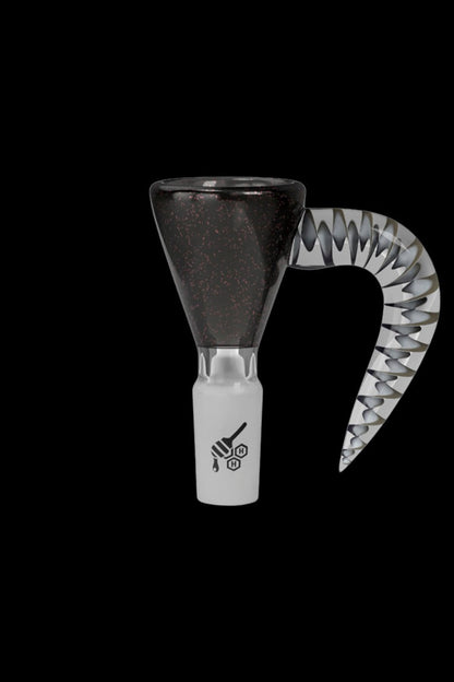 Black and white glass cannabis water pipe attachment.