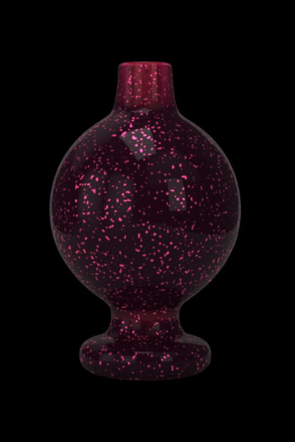 Pink speckled glass dome for a dab rig.