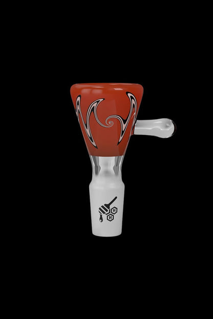 Red and white glass smoking bowl with intricate designs and a branded base.