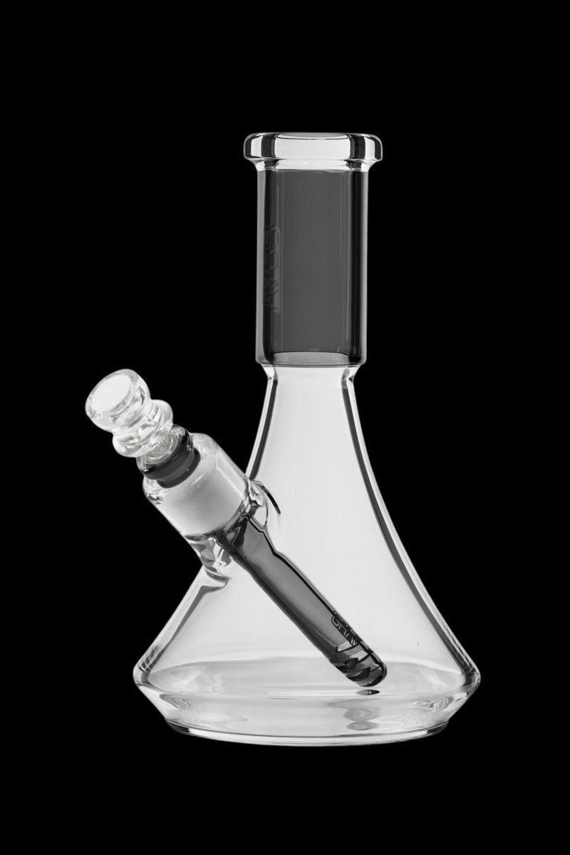 Clear glass beaker bong with a downstem.