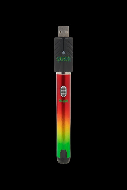 Ooze pen-style vape battery with USB charger, red and green gradient.