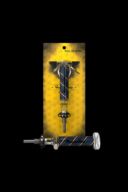 Dab tool with a blue glass tip and ornate metal design, packaged in a patterned gold sleeve.