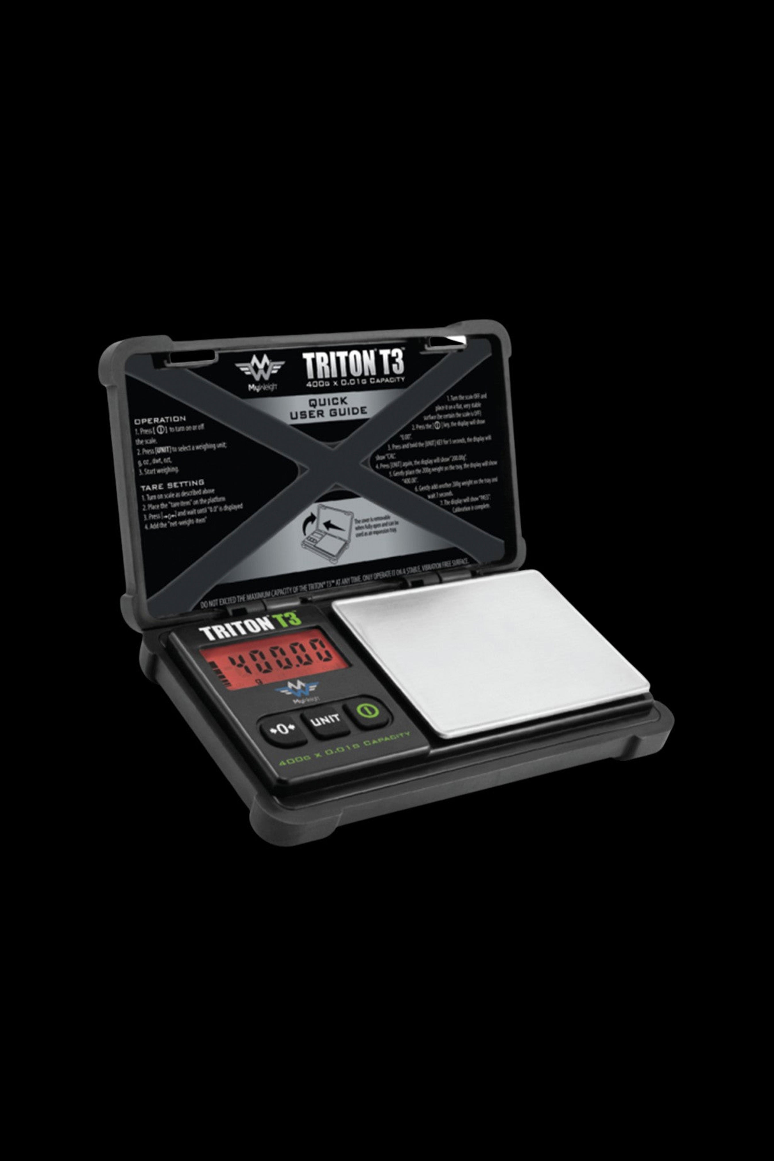 Digital scale with an open cannabis container, displaying a weight reading.