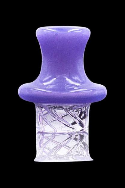 Close-up front view of The Stash Shack UFO Spinning Carb Cap in slime green, glossy top over a clear glass spiral base.
