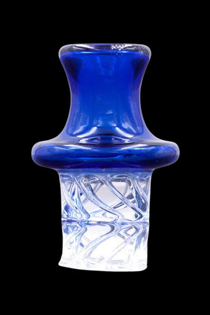 Close-up front view of the purple The Stash Shack UFO Spinning Carb Cap showing a glossy flared top and a clear twisted-glass stem against a black background