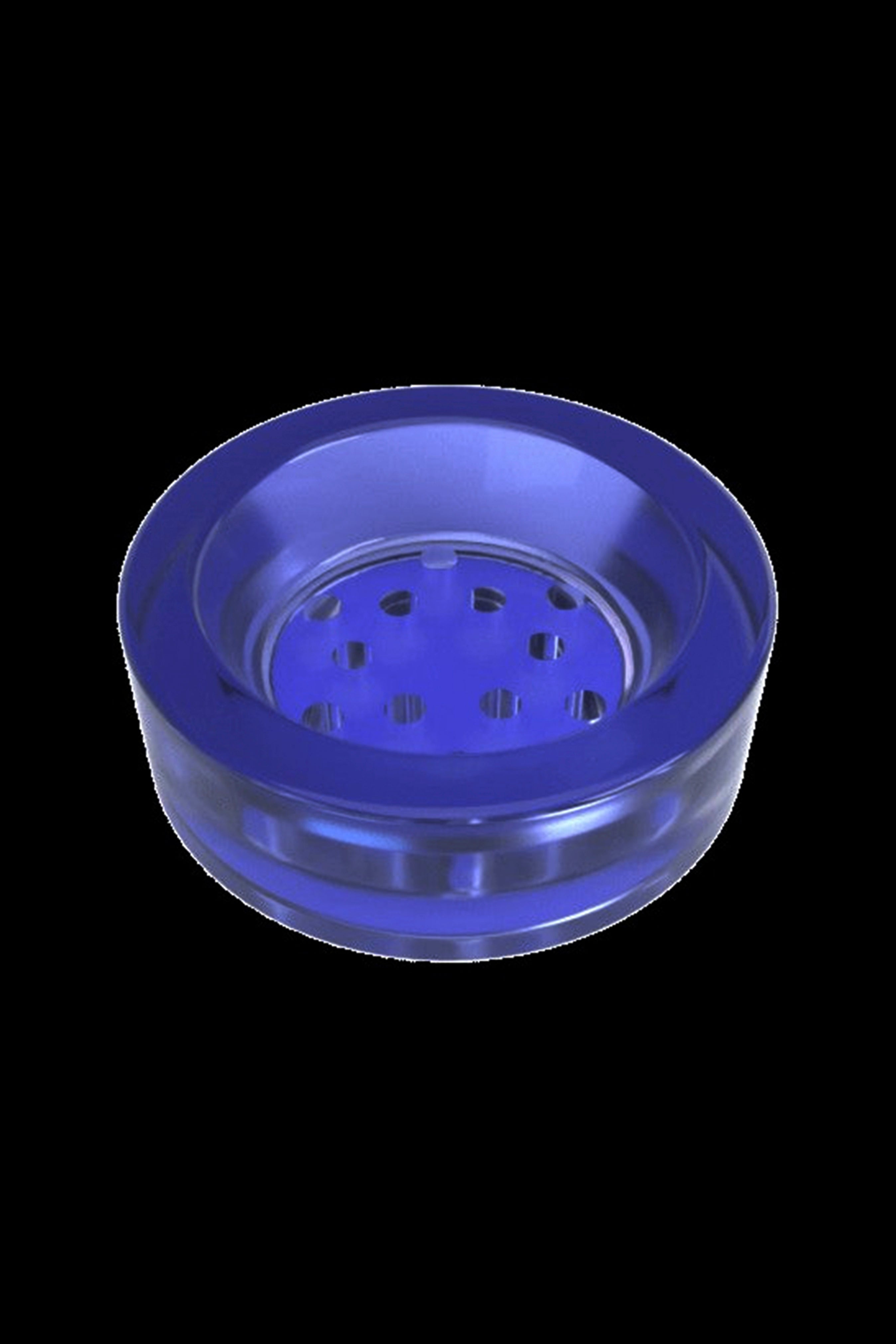 Blue glass hash bowl with multiple holes.