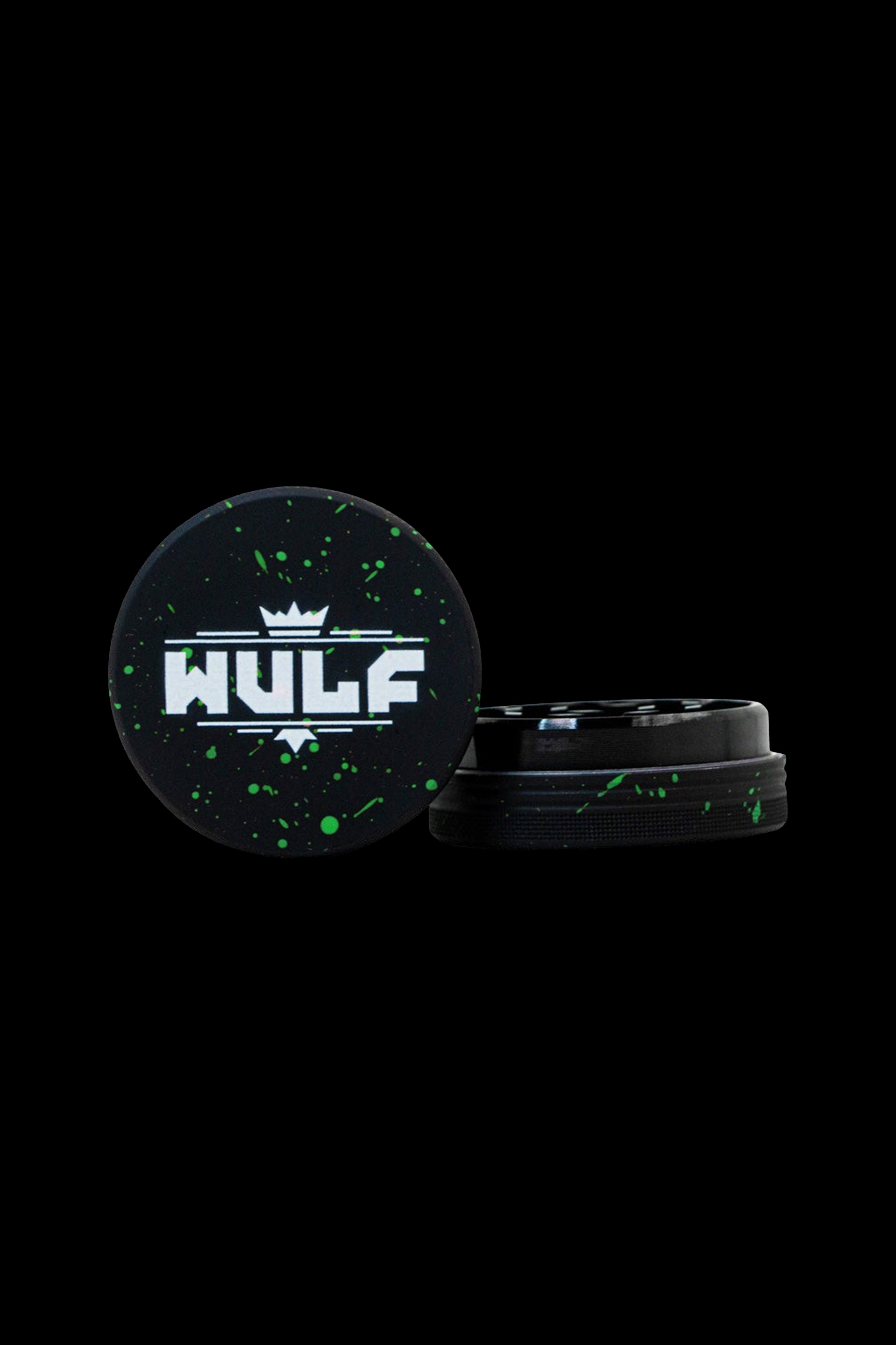 HULP grinder with black and green splatter design on a dark background.