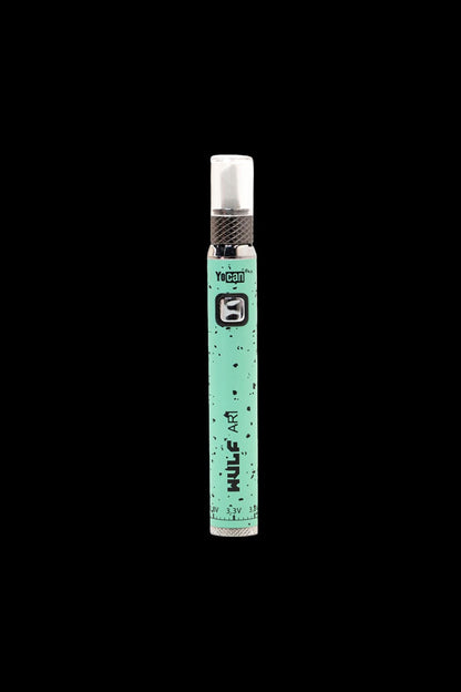 Green Yocan vape pen isolated on a black background.