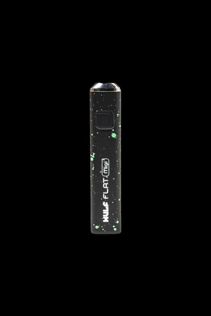 Black cannabis vape pen with green splatter design.