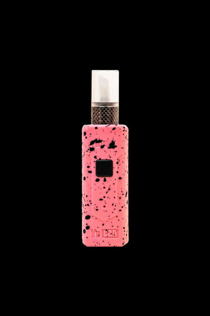Pink Yocan vape pen with splatter design.