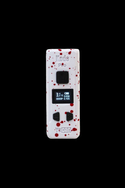 Yocan Evolve Plus vape pen with a red splatter pattern and digital display.