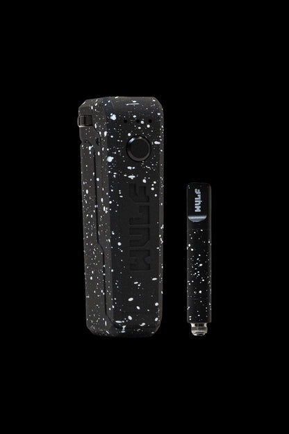 White and black speckled cannabis vape pen and charging case.