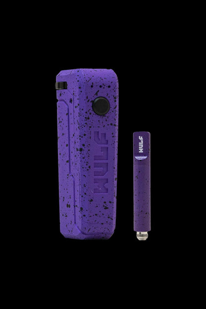 Purple cannabis vape pen and charging case against a black background.