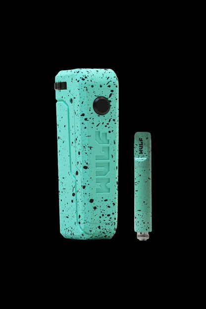 Turquoise cannabis vape pen and cartridge set with speckled design.