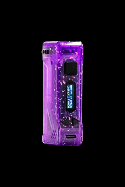 Purple cannabis vaporizer device with digital display, isolated on black.
