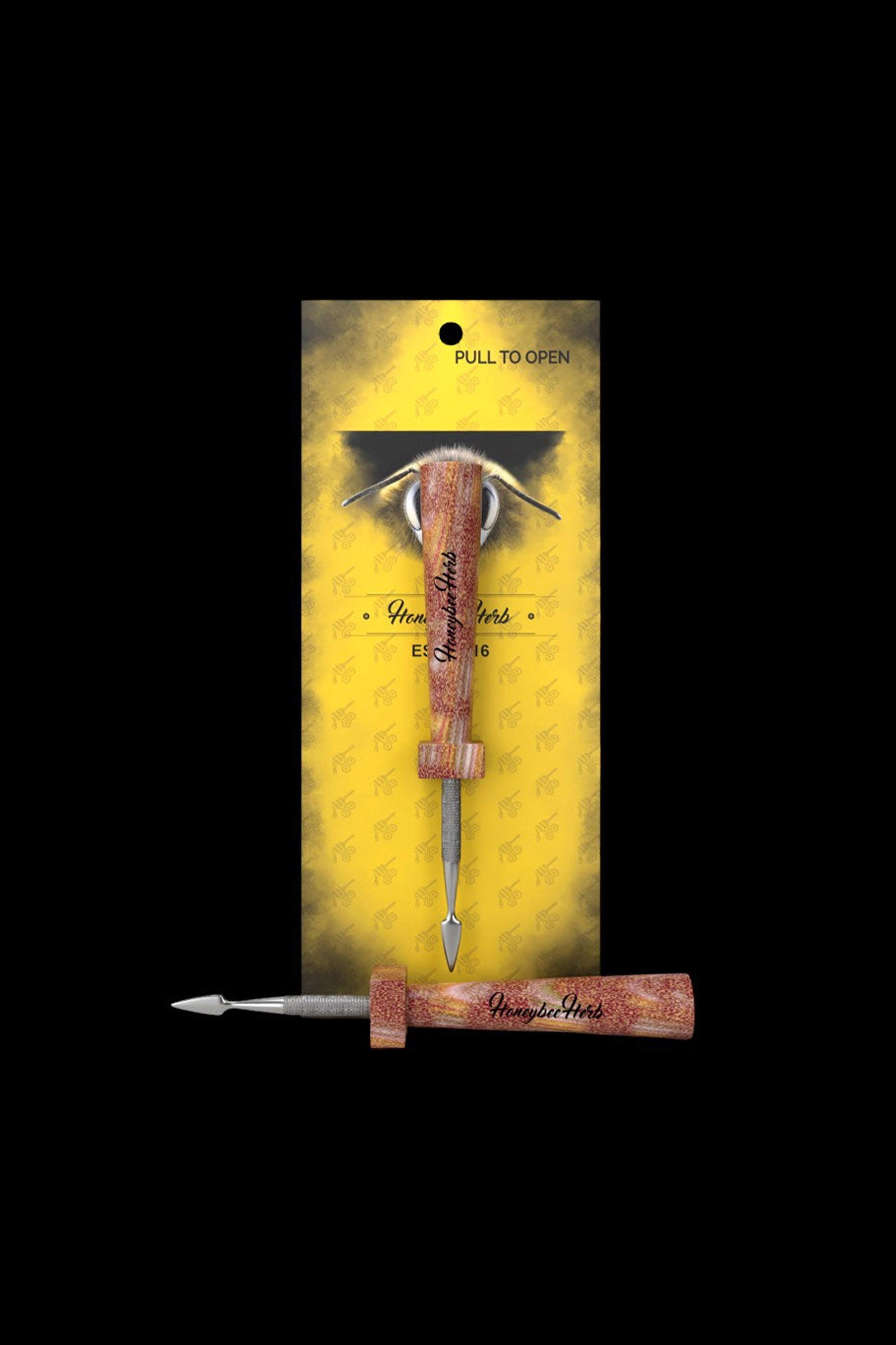 Gold cannabis dab tool with a bee illustration on its yellow packaging, branded "Honeybee Herb".