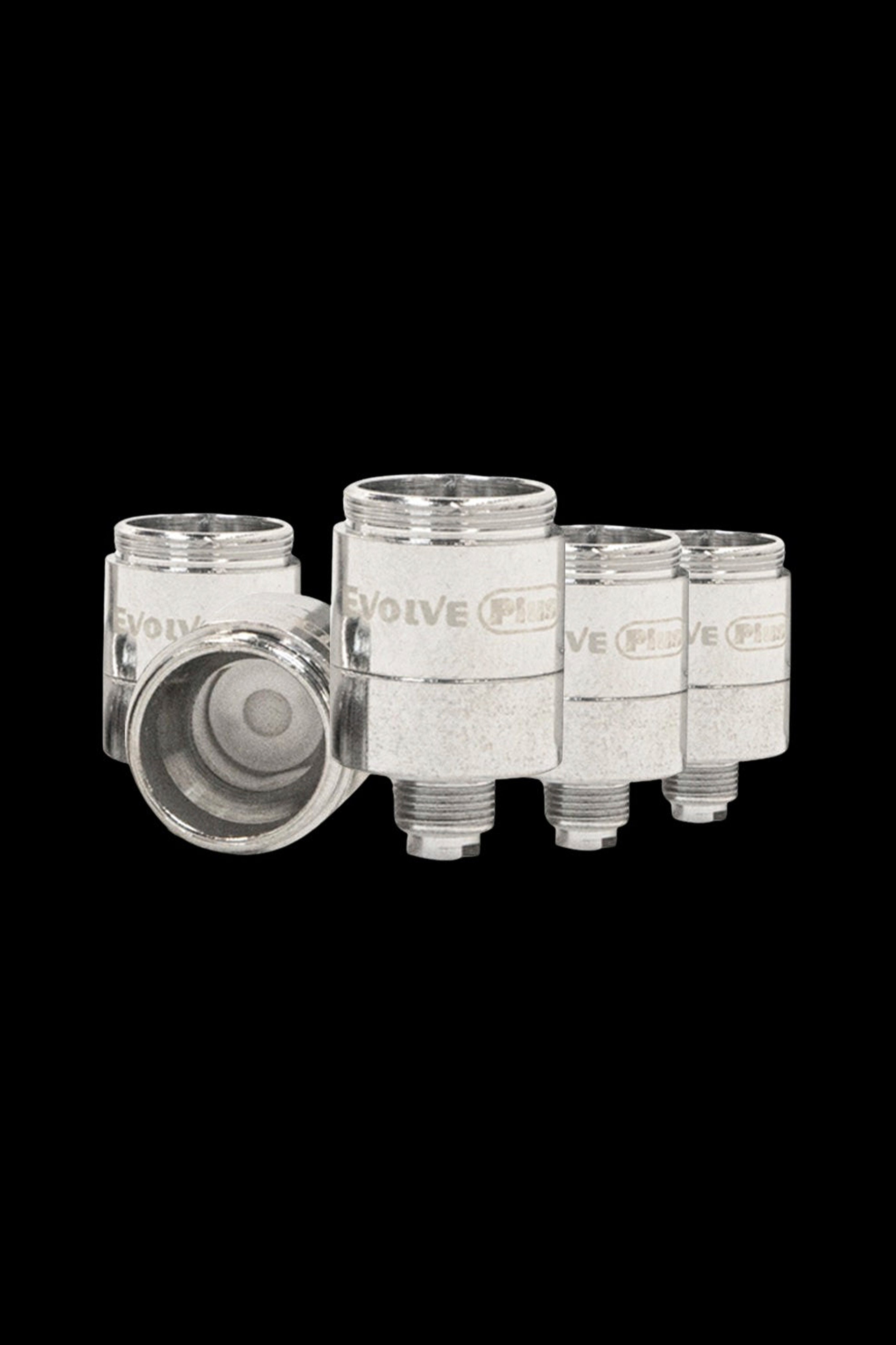 Four silver cannabis oil cartridges and one disassembled cartridge showing the internal chamber.