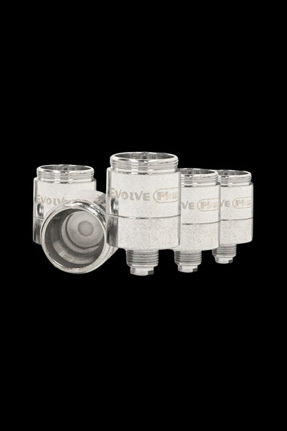 Four silver cannabis oil cartridges and one disassembled cartridge showing the internal chamber.