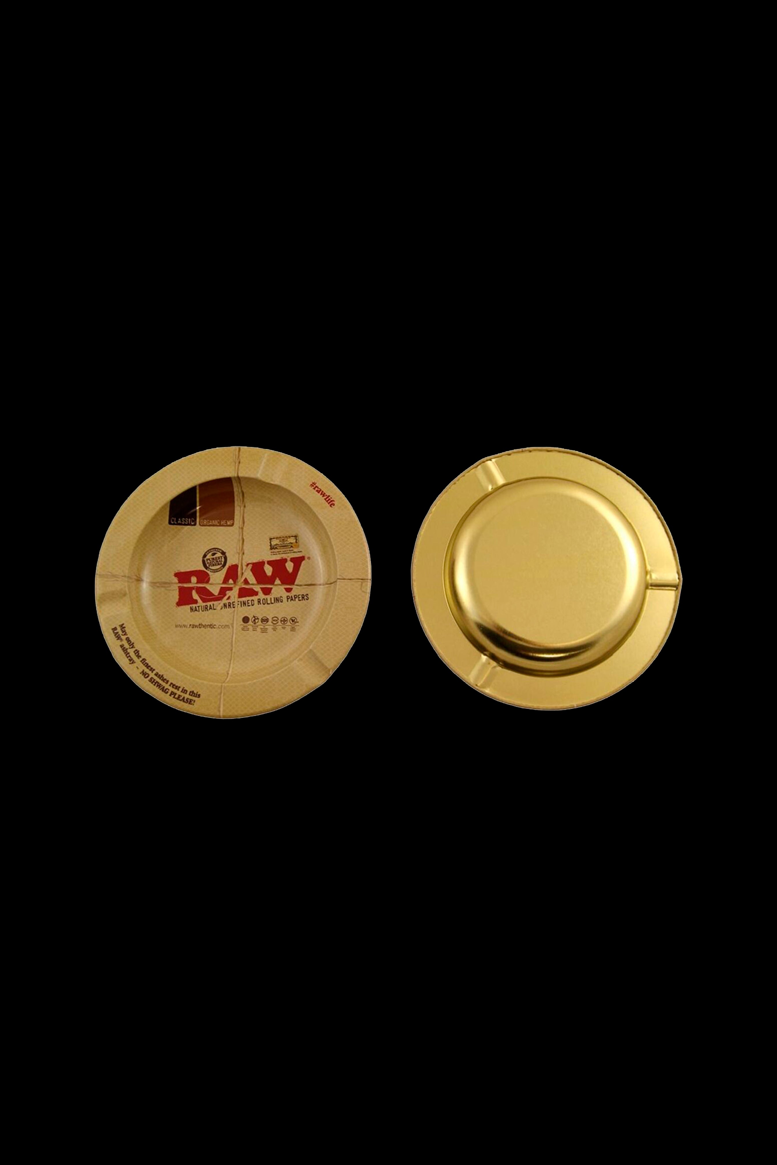 Gold rolling paper container with RAW branding.