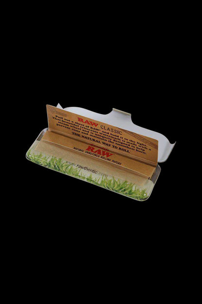 Pack of RAW Classic natural rolling papers against a black background.