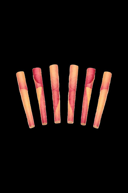 Seven pre-rolled cannabis cigarettes against a black background.