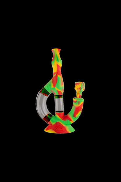 Colorful glass water pipe (bong) isolated on a black background.